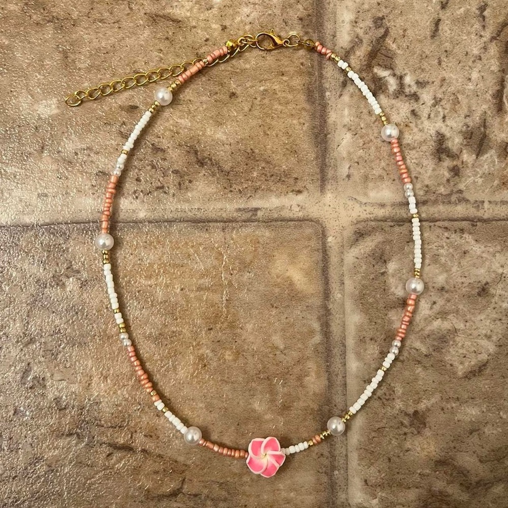 Rose gold plumeria necklace